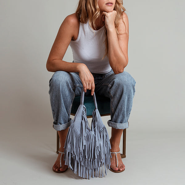 DAKOTA - Suede bag with blue fringes