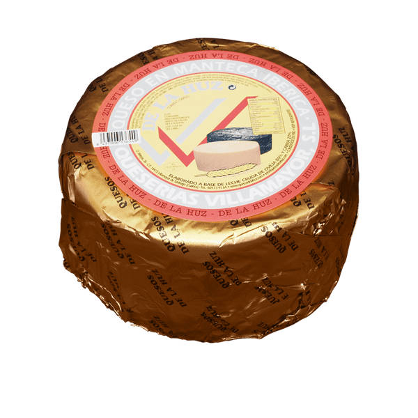 Assortment of 2 Cheeses World Cheese Awards: Don Cayo Curado Grande (3Kg) Manchego D.O.P. + De la Huz de Oveja-Cabra Curado en Manteca Grande (3Kg)