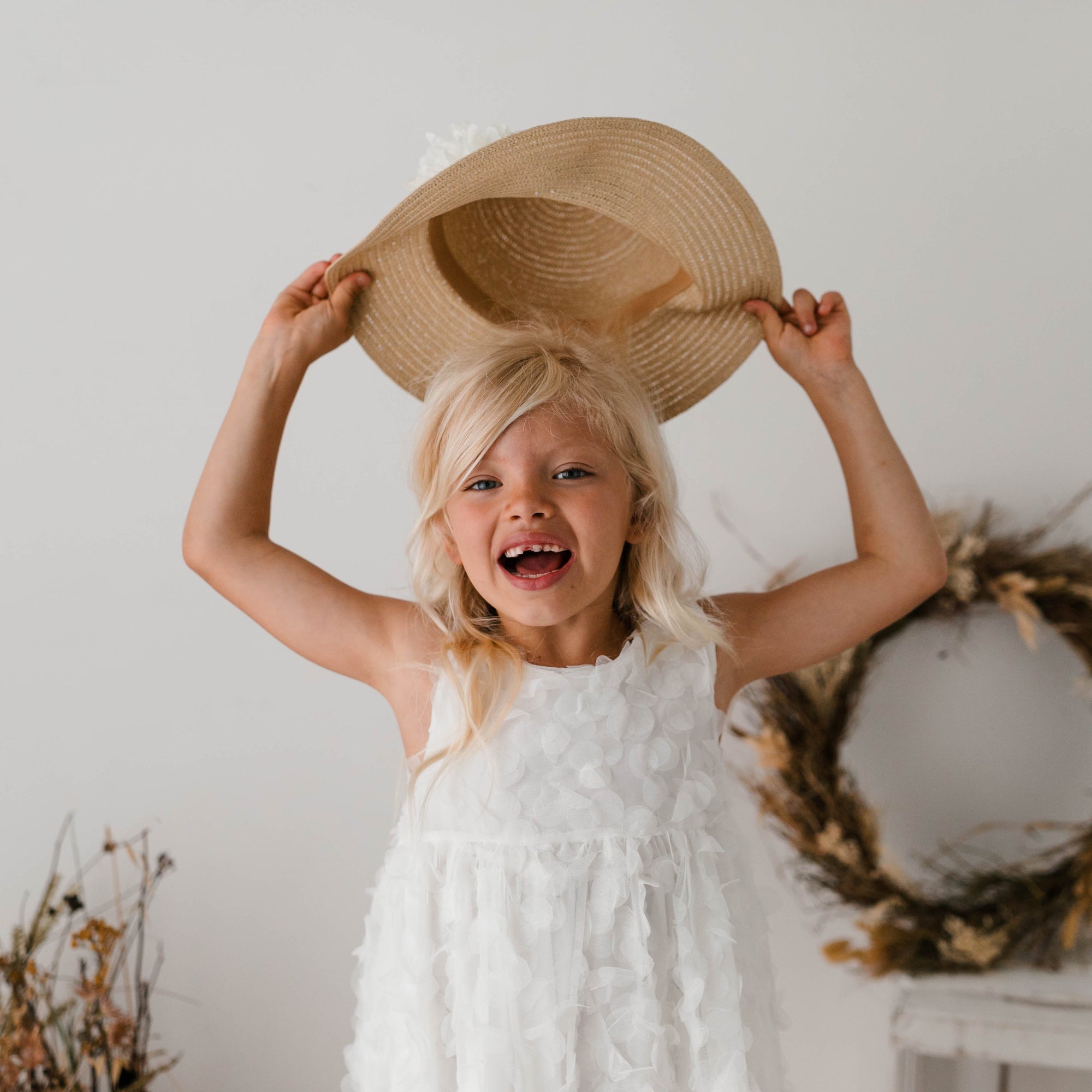 DRESS WITH PETALS AND BOW