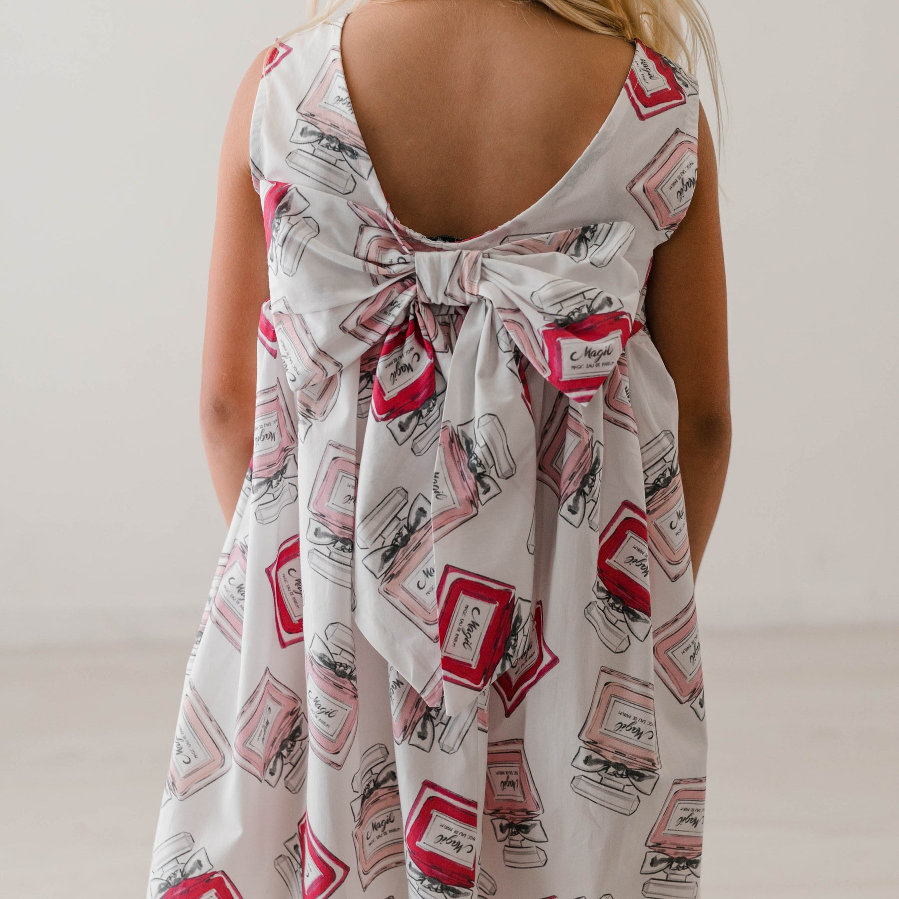 COTTON PRINTED DRESS WITH BOW ON THE BACK