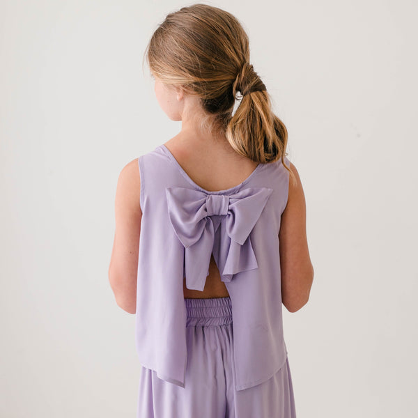VISCOSITY TOP WITH LARGE BOW ON THE BACK