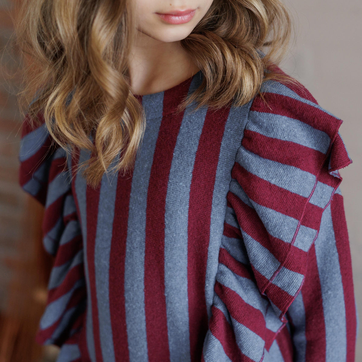 MAGLIA RIGATA CON FRAPPE