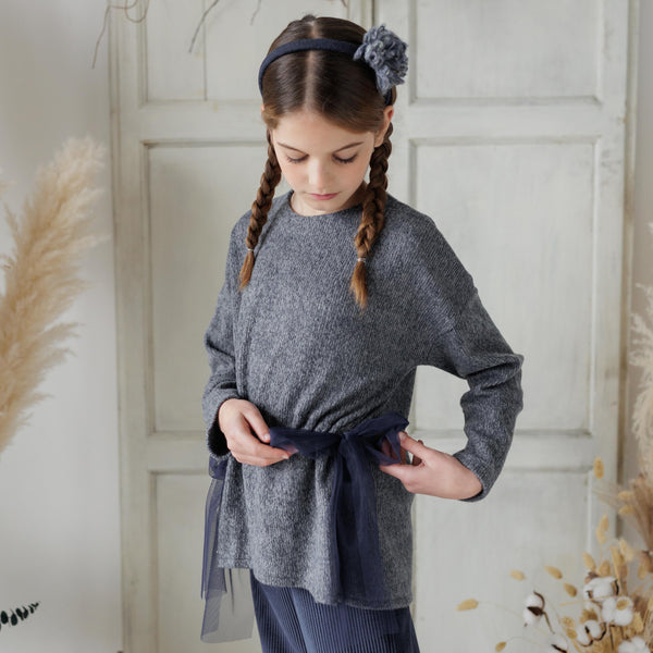 MAGLIA MORBIDA CON FIOCCHI TULLE IN VITA