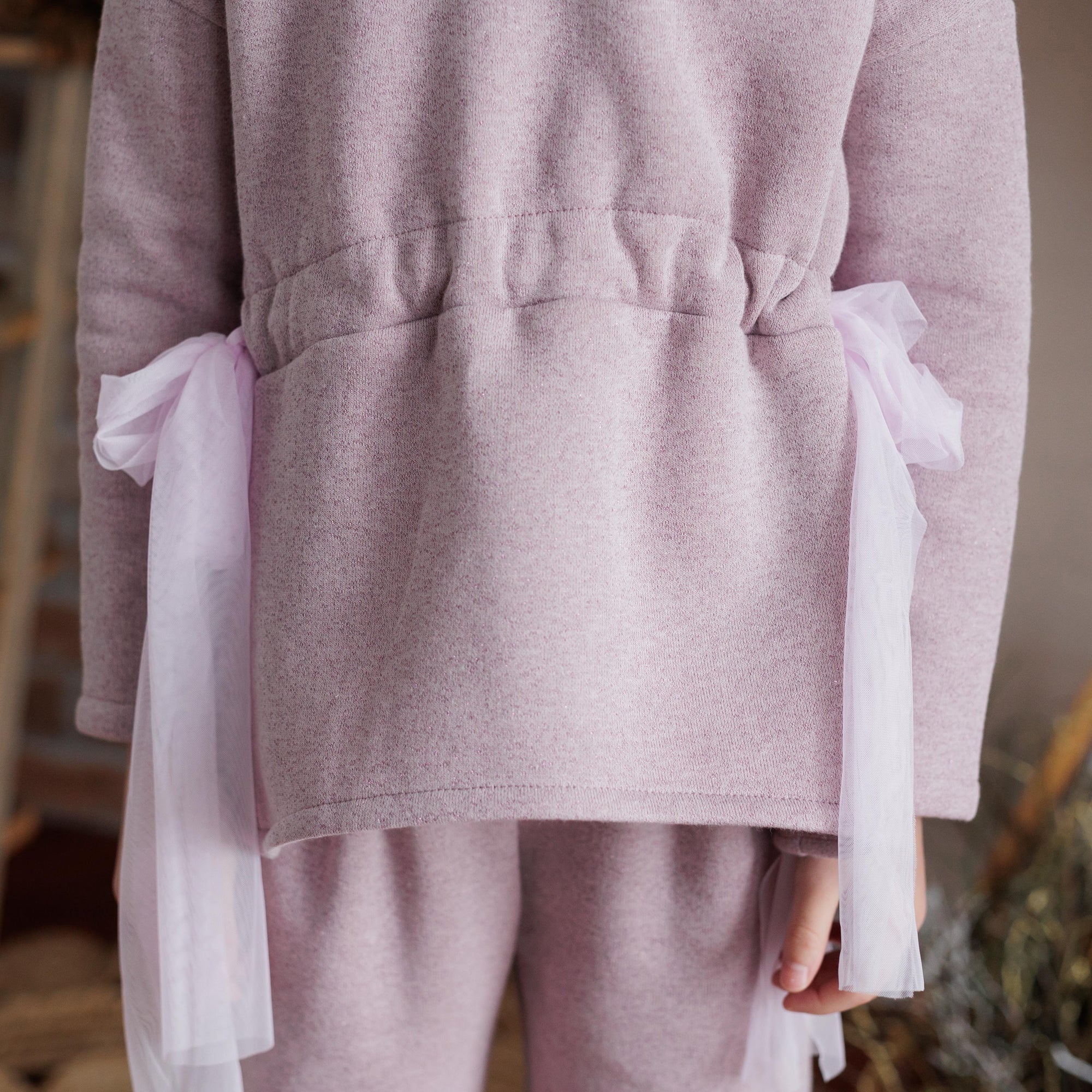 MAGLIA FELPA LUREX CON FIOCCHI IN VITA