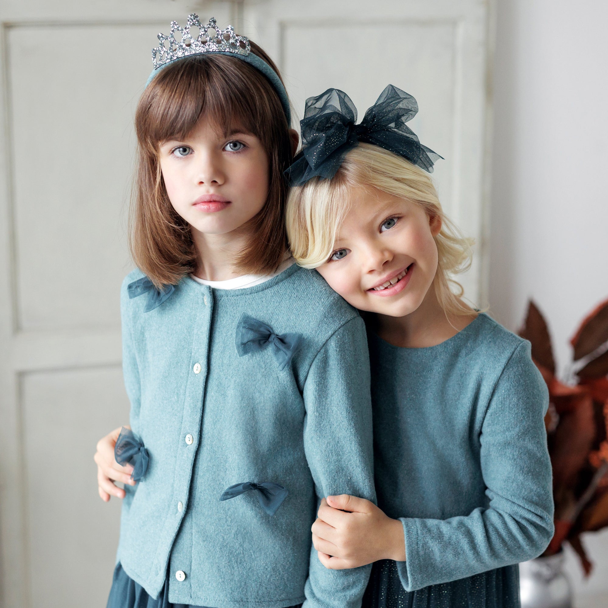 CARDIGAN CON FIOCCHIETTI TULLE