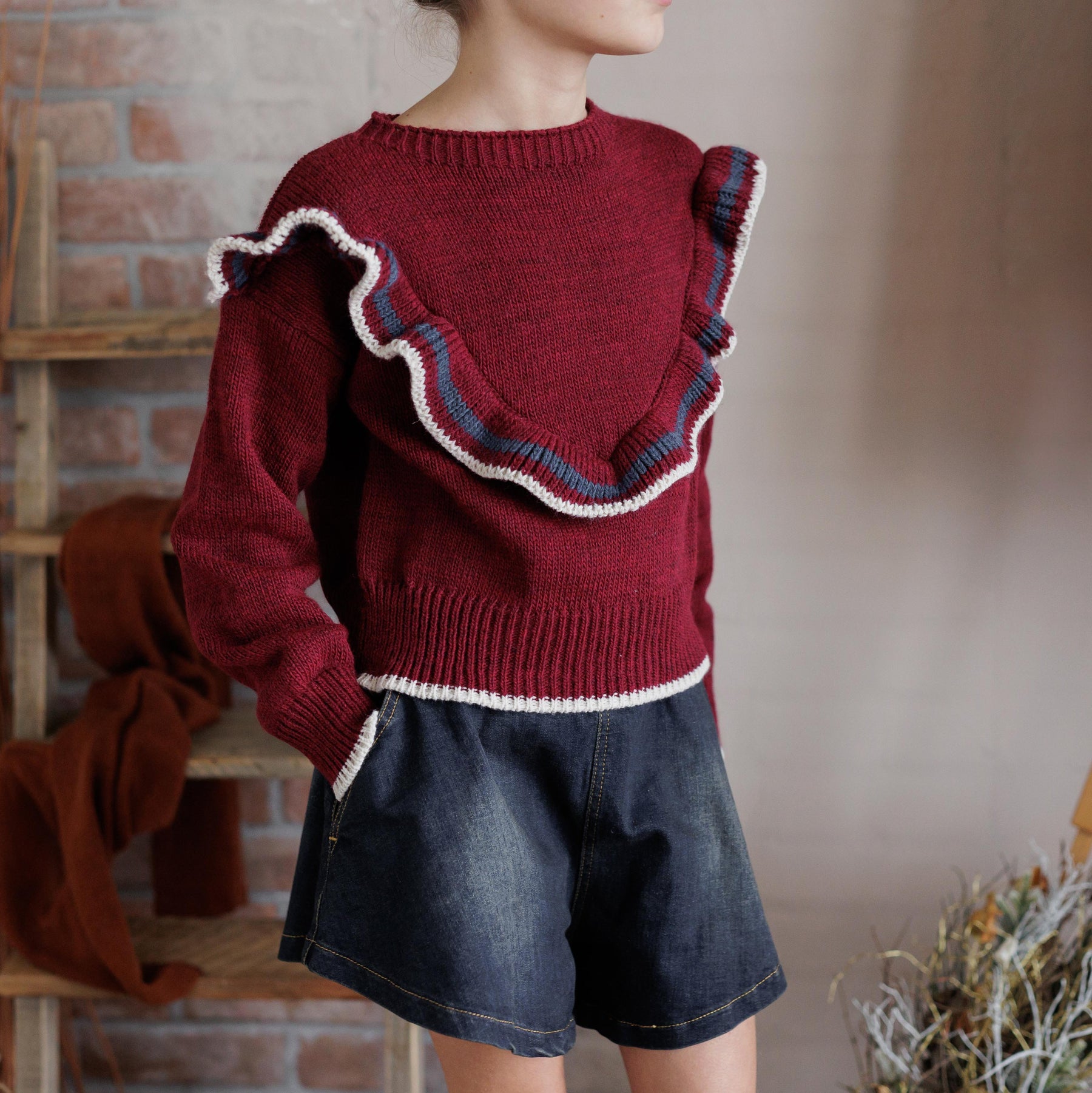 PULLOVER CON FRAPPE