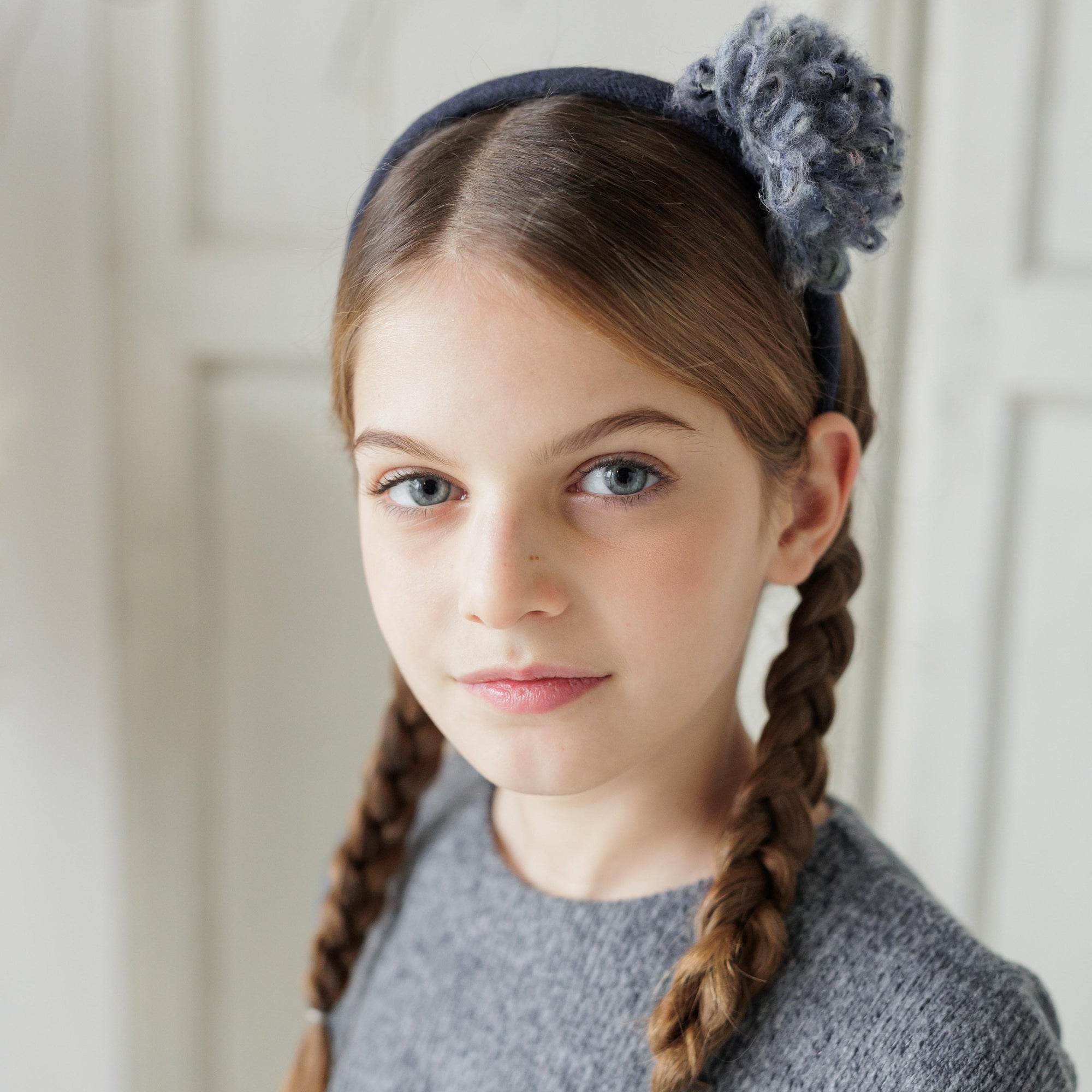 CERCHIETTO CON POM PON