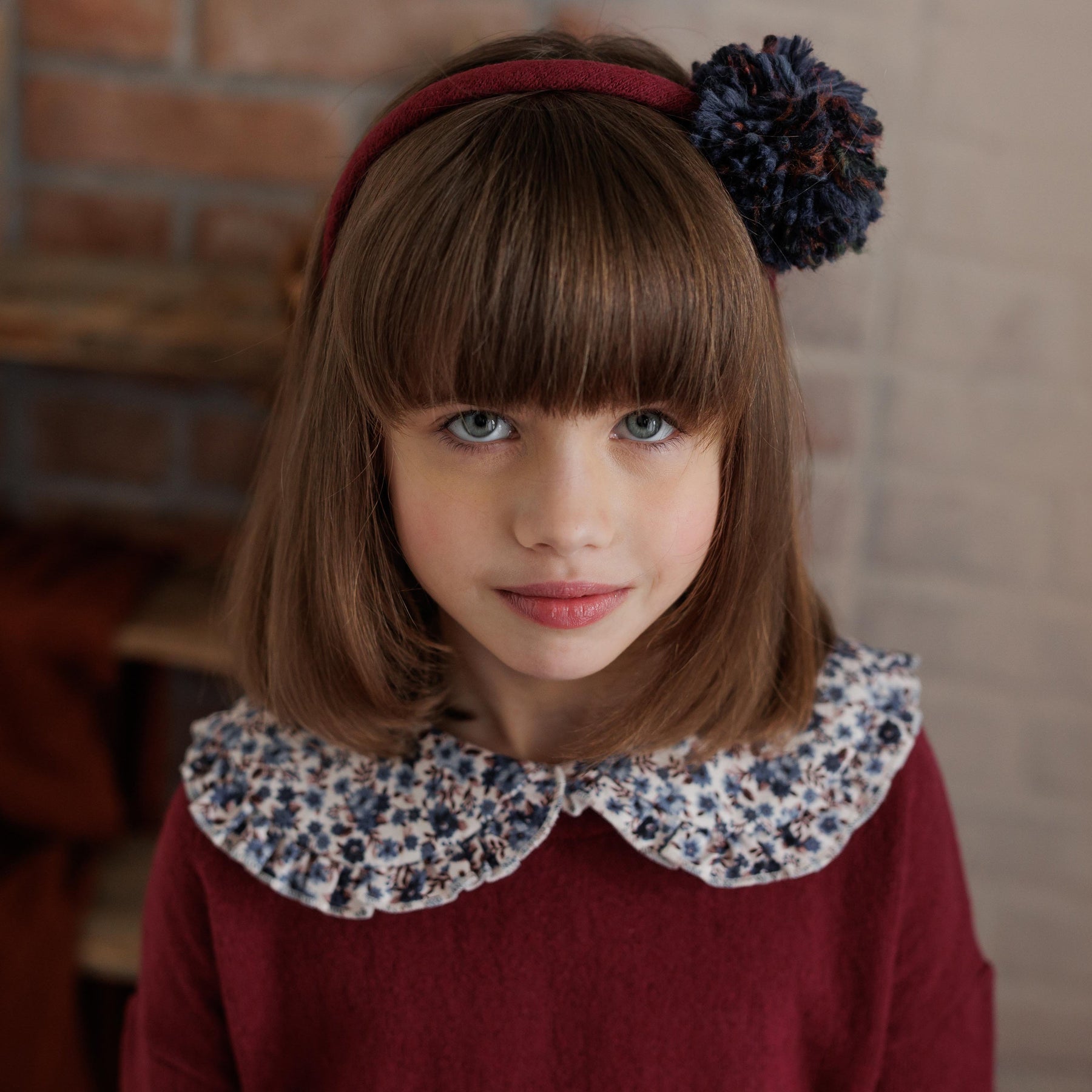 CERCHIETTO POMPON LANA