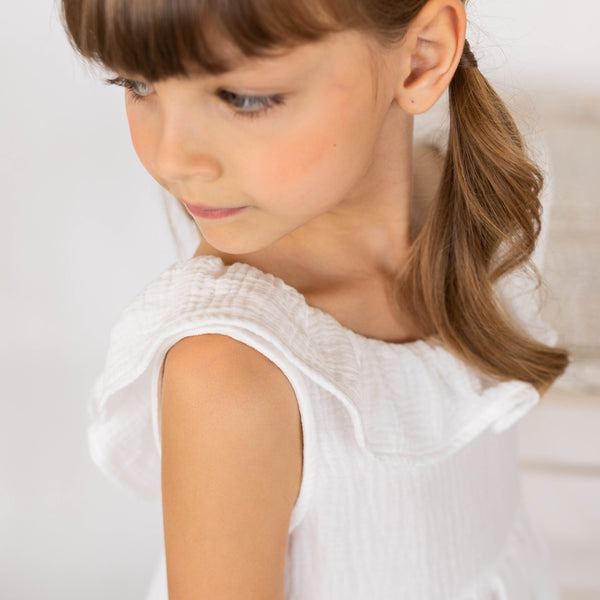 abito in garza con ricamo