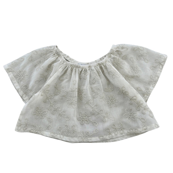 top in cotone con fiori ricamati