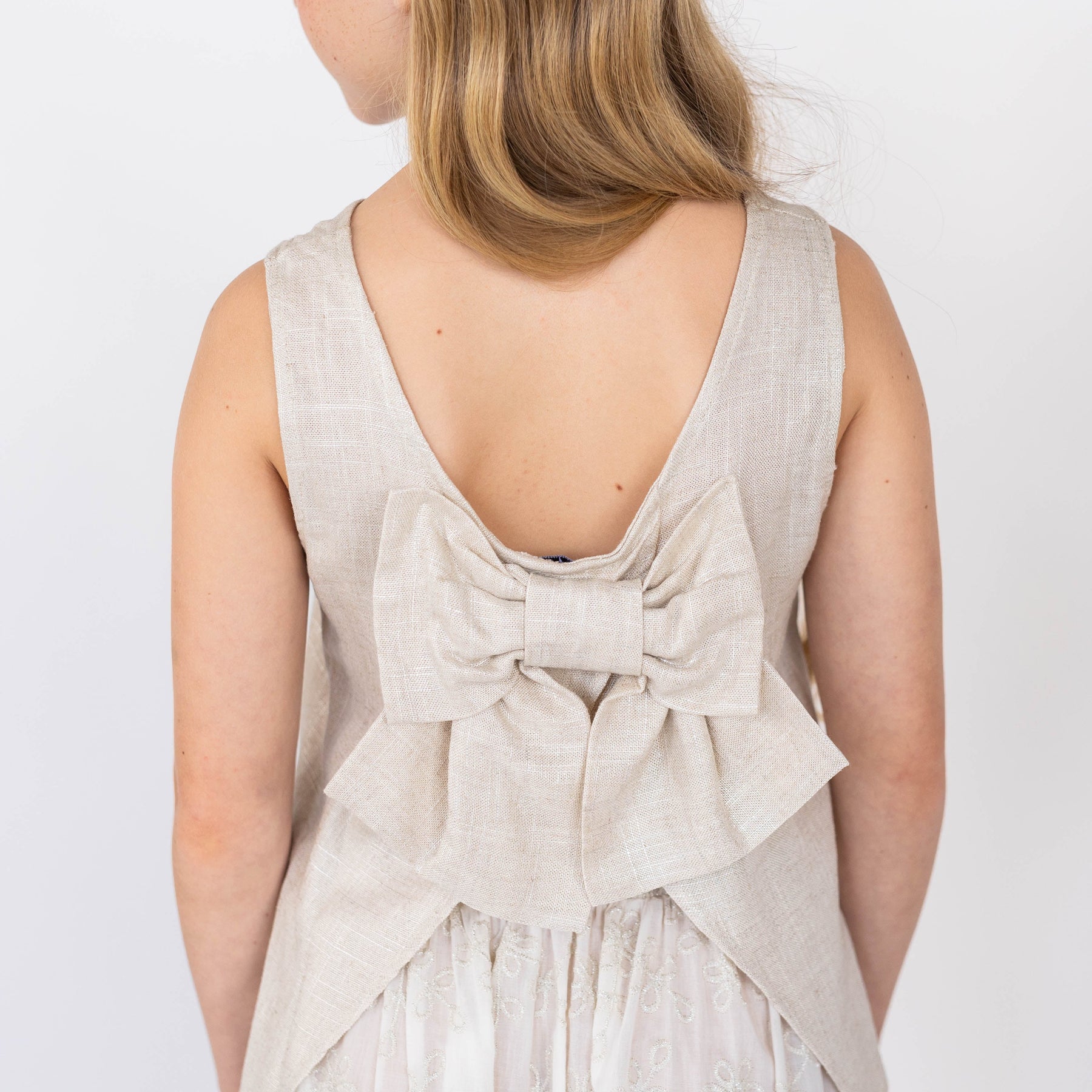 top in lino con maxi fiocco
