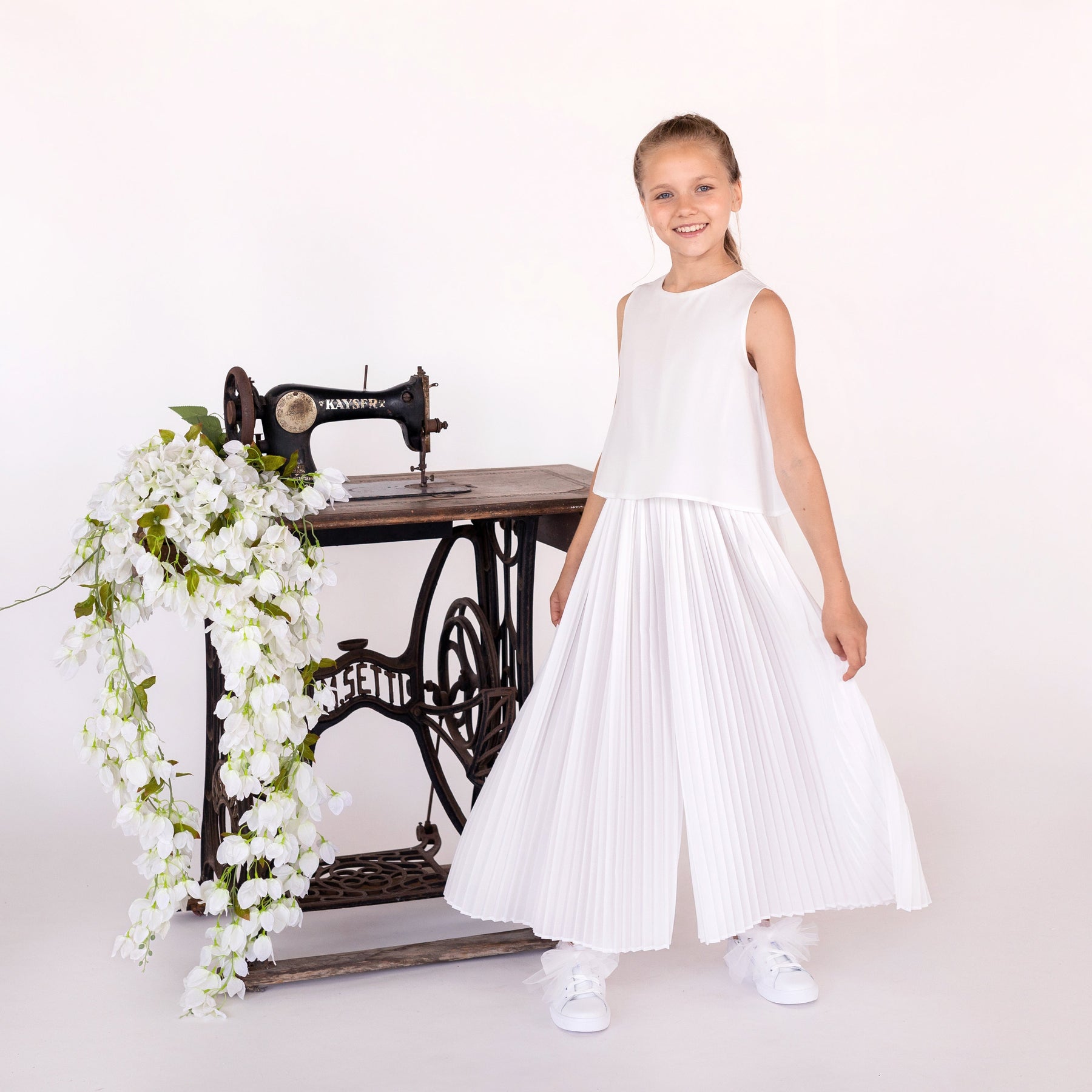 JUMPSUIT MET GEPLISSEERDE BROEKEN