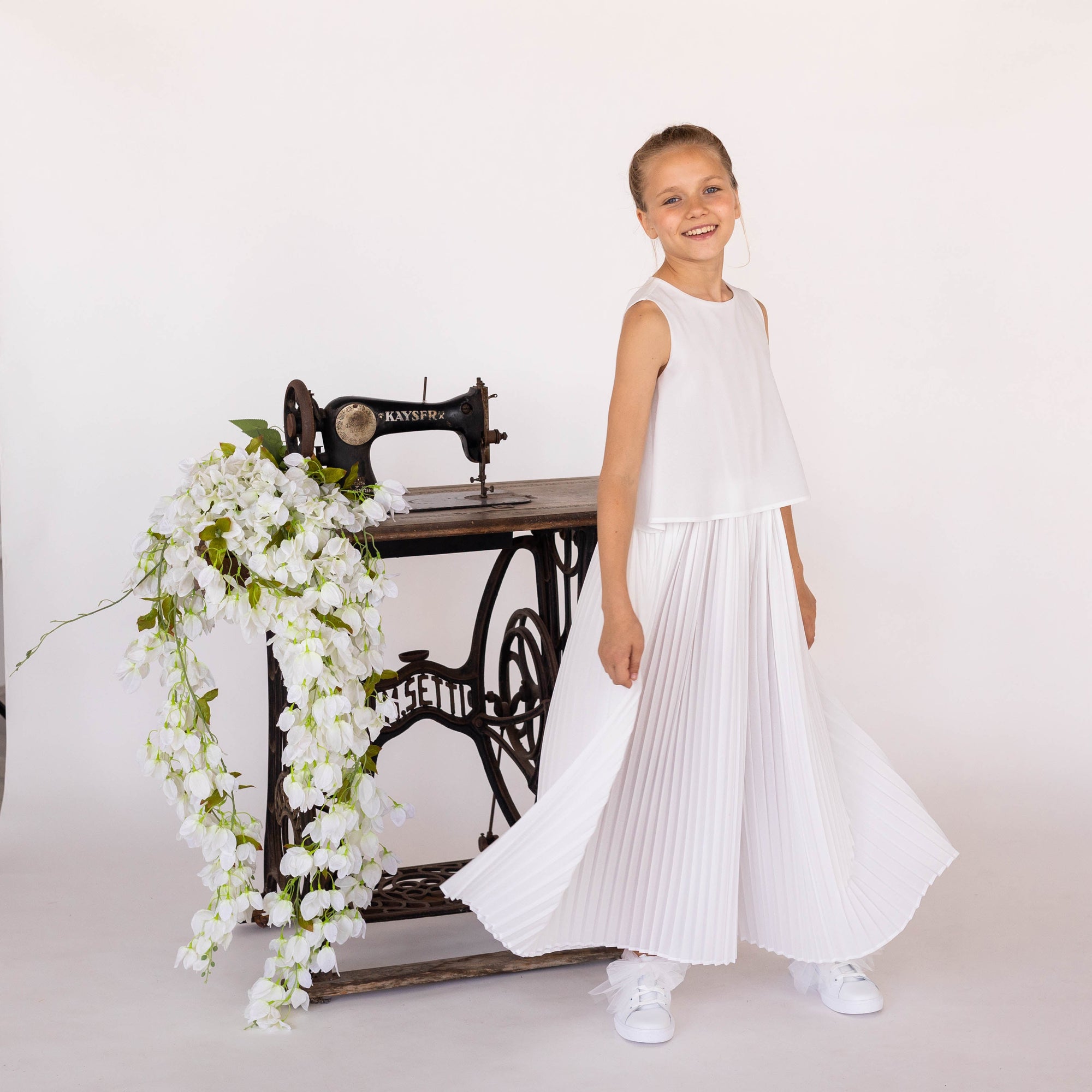 JUMPSUIT MET GEPLISSEERDE BROEKEN