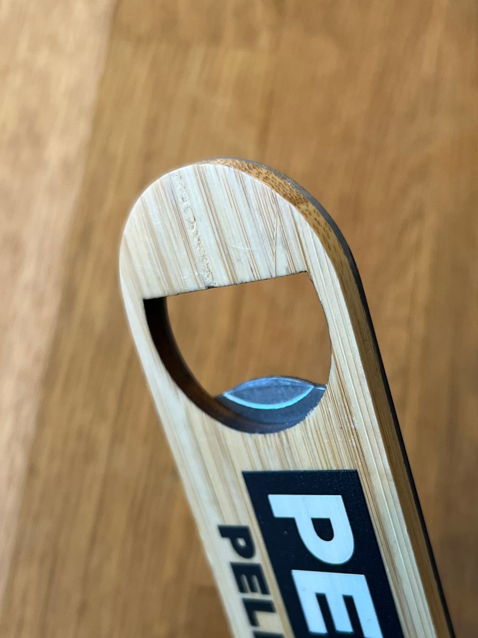 Bottle opener with two-color inscription Pelicon (stainless steel/wood)