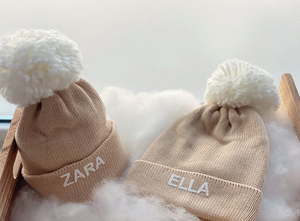 Otroška zimska kapa s pomponom