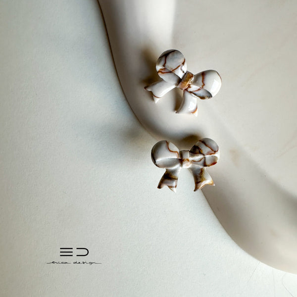 bow studs | marble
