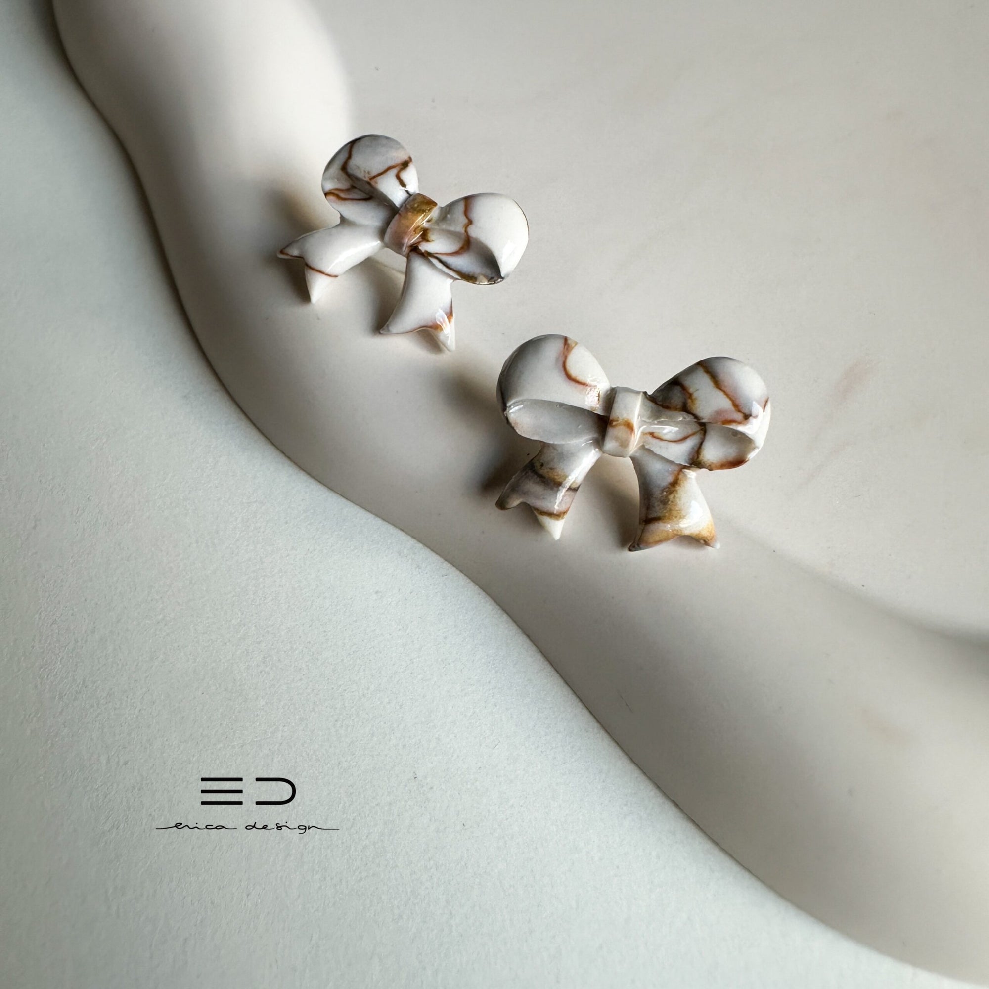 bow studs | marble