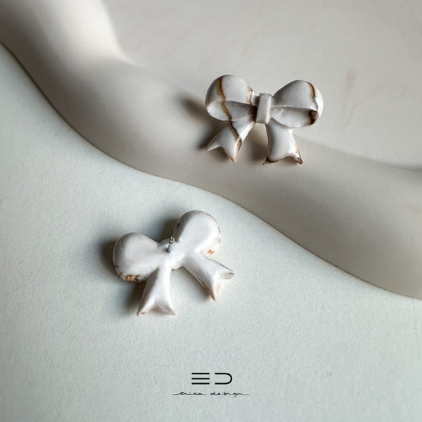 bow studs | marble