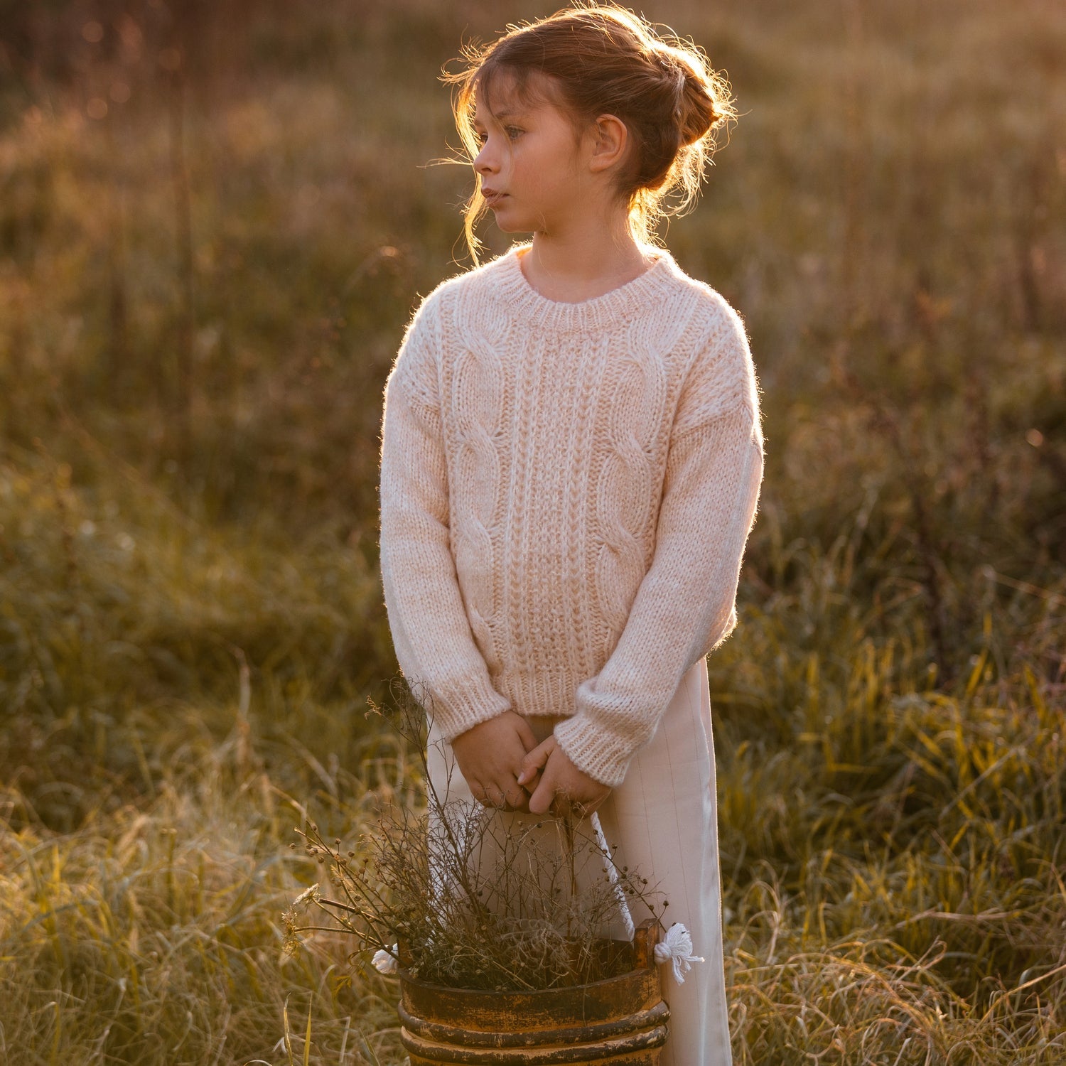 MAGLIONE CON TRECCE