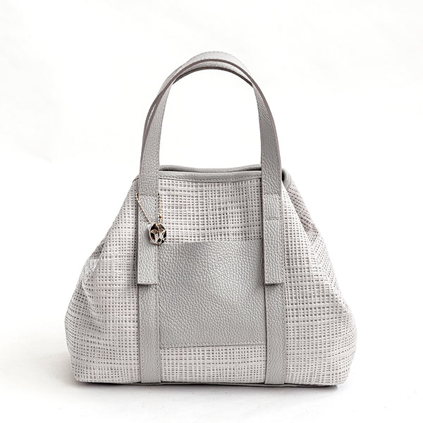 JAMAICA – Laser-cut leather bag in milk color