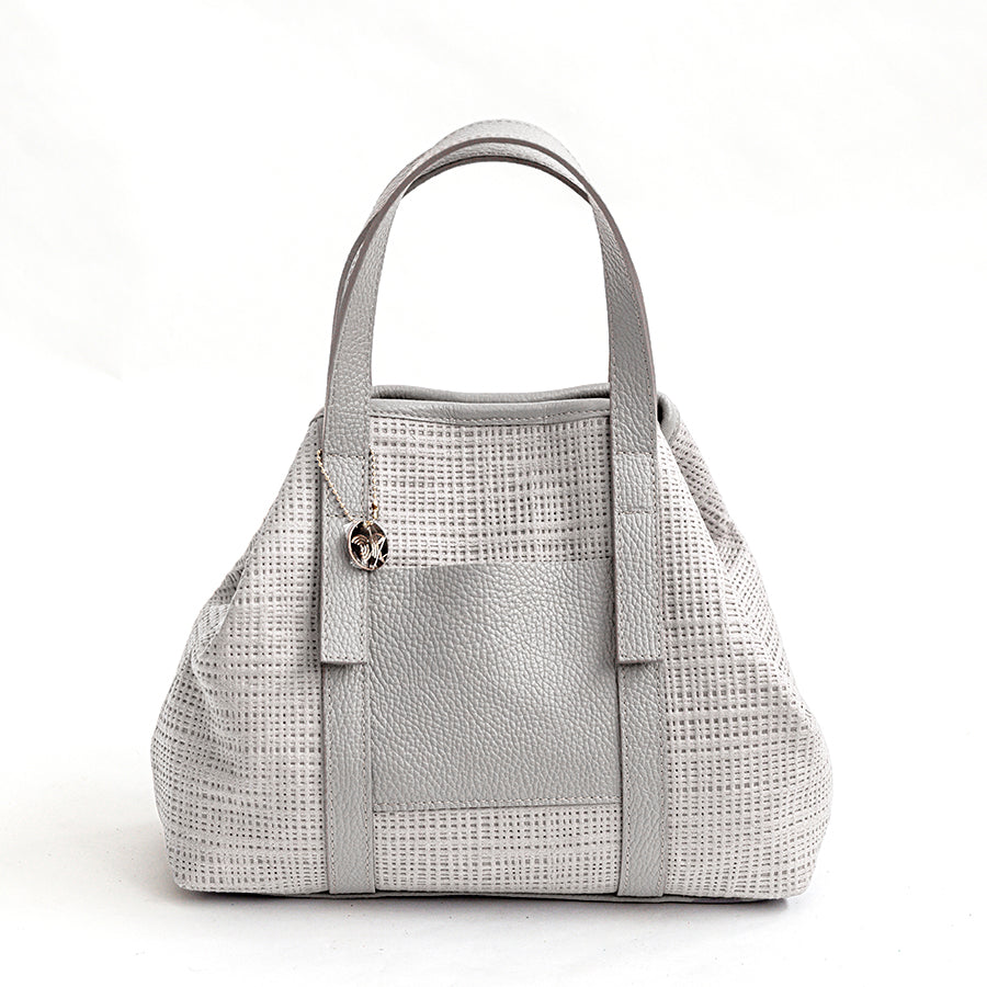 JAMAICA – Laser-cut leather bag in milk color