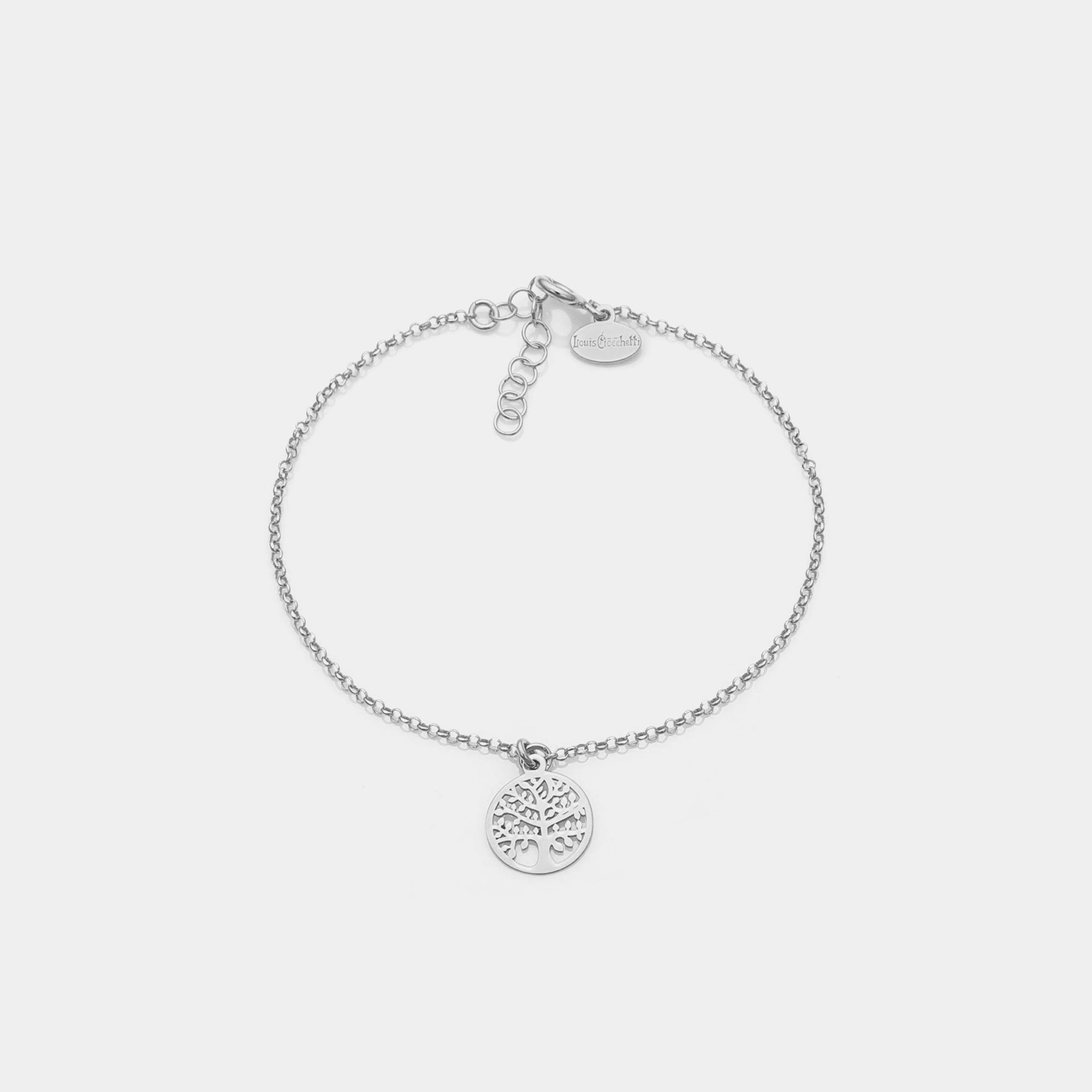 Rhodium-plated silver bracelet with pierced tree of life pendant and round frame
