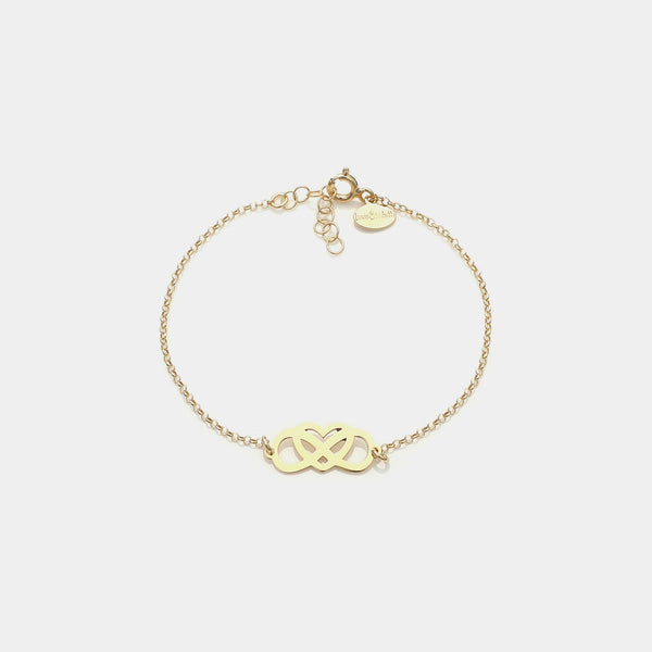 Bracciale argento dorato con centrale infinito e cuore intrecciati e traforati