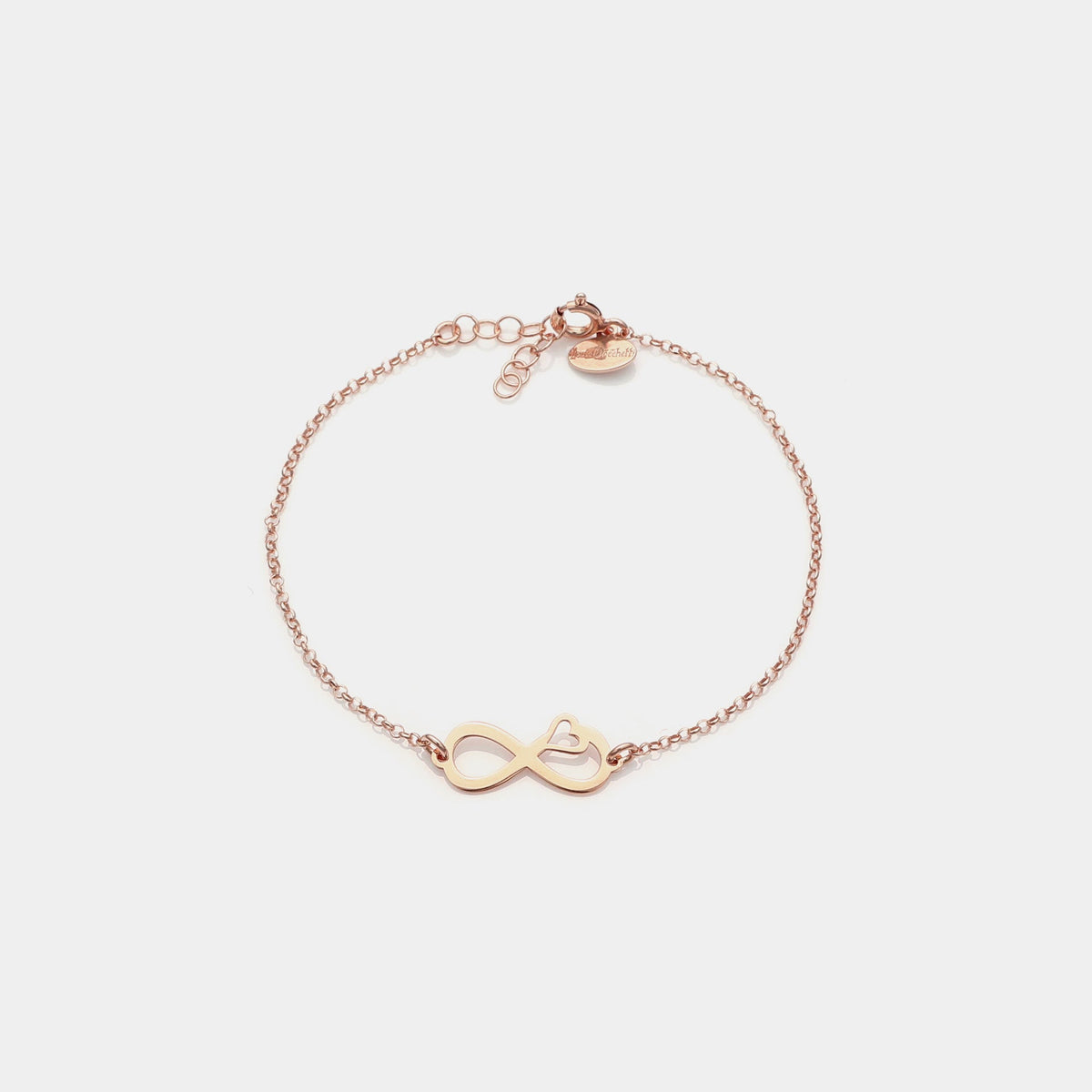 Rose gold plated silver bracelet with pierced infinity center and side heart