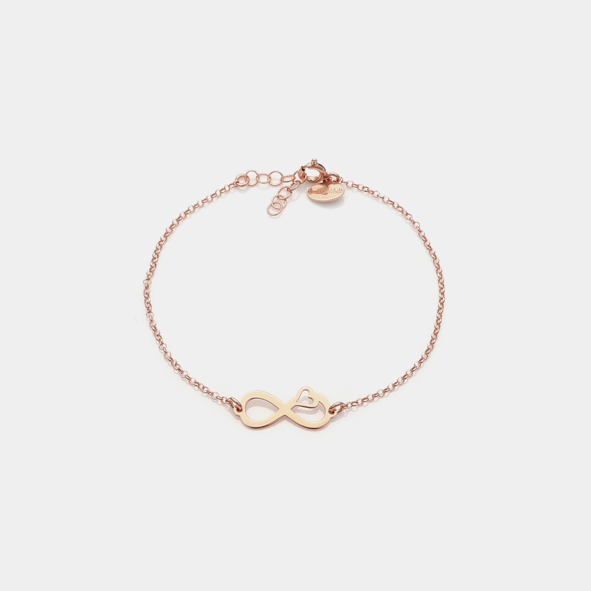Rose gold plated silver bracelet with pierced infinity center and side heart