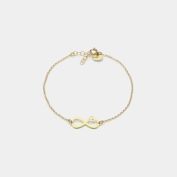 Gold-plated silver bracelet with pierced infinity center and side heart