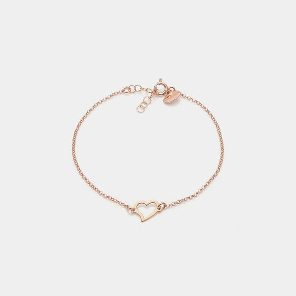 Rose gold plated silver bracelet with twisted pierced heart centerpiece