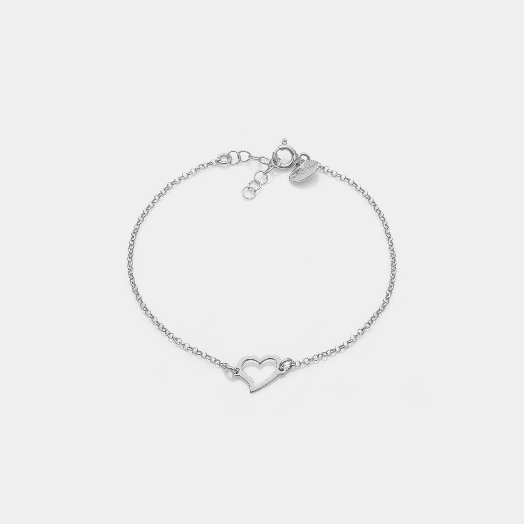 Rhodium-plated silver bracelet with twisted pierced heart centerpiece