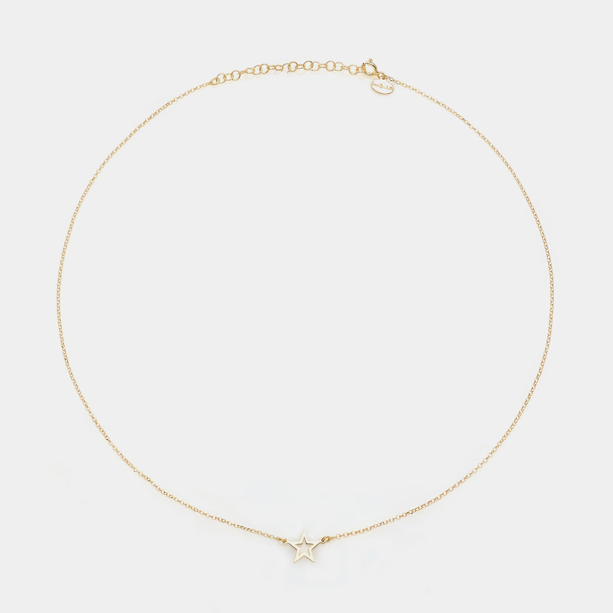 Gold-plated silver necklace with pierced star centerpiece