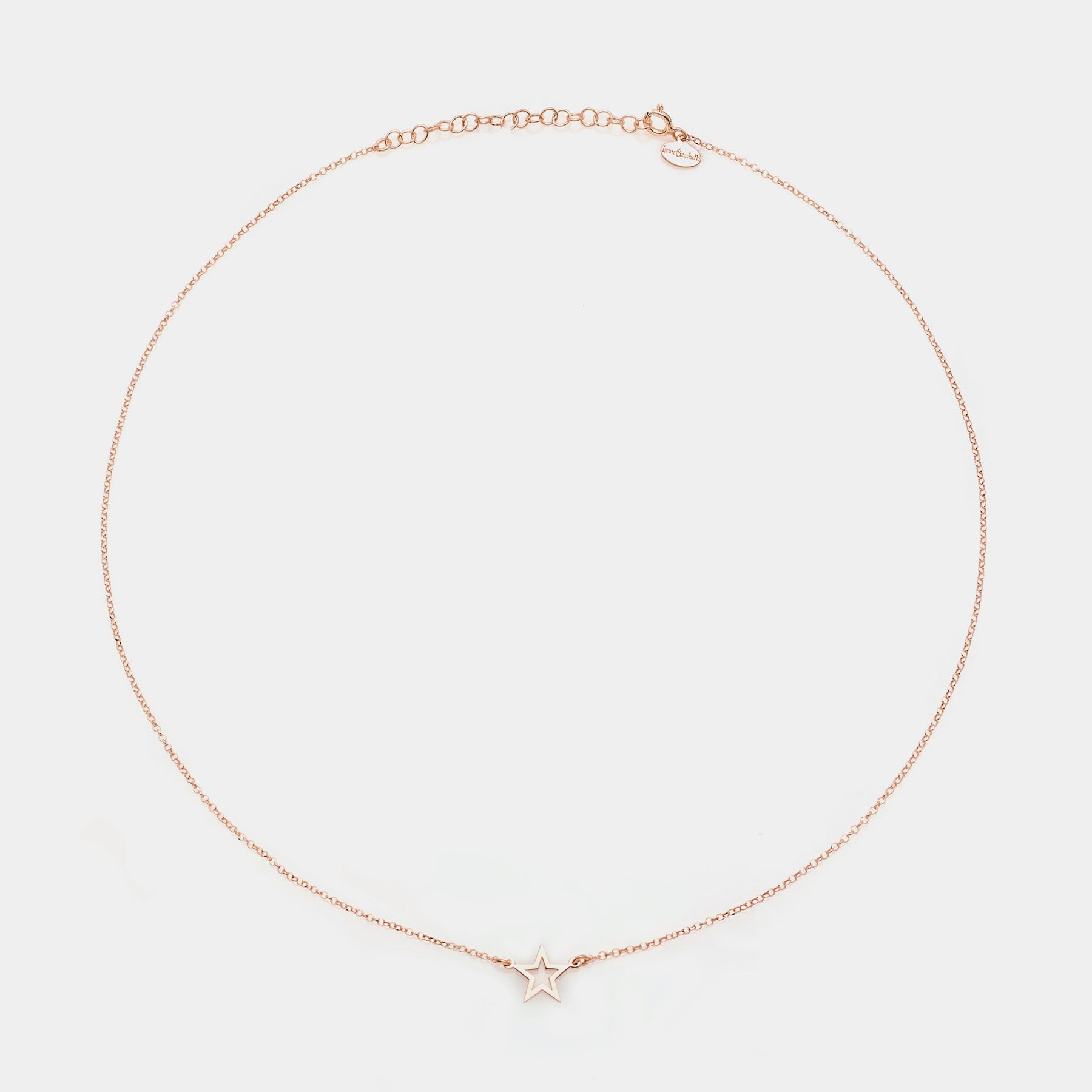 Rose gold silver necklace with pierced star centerpiece