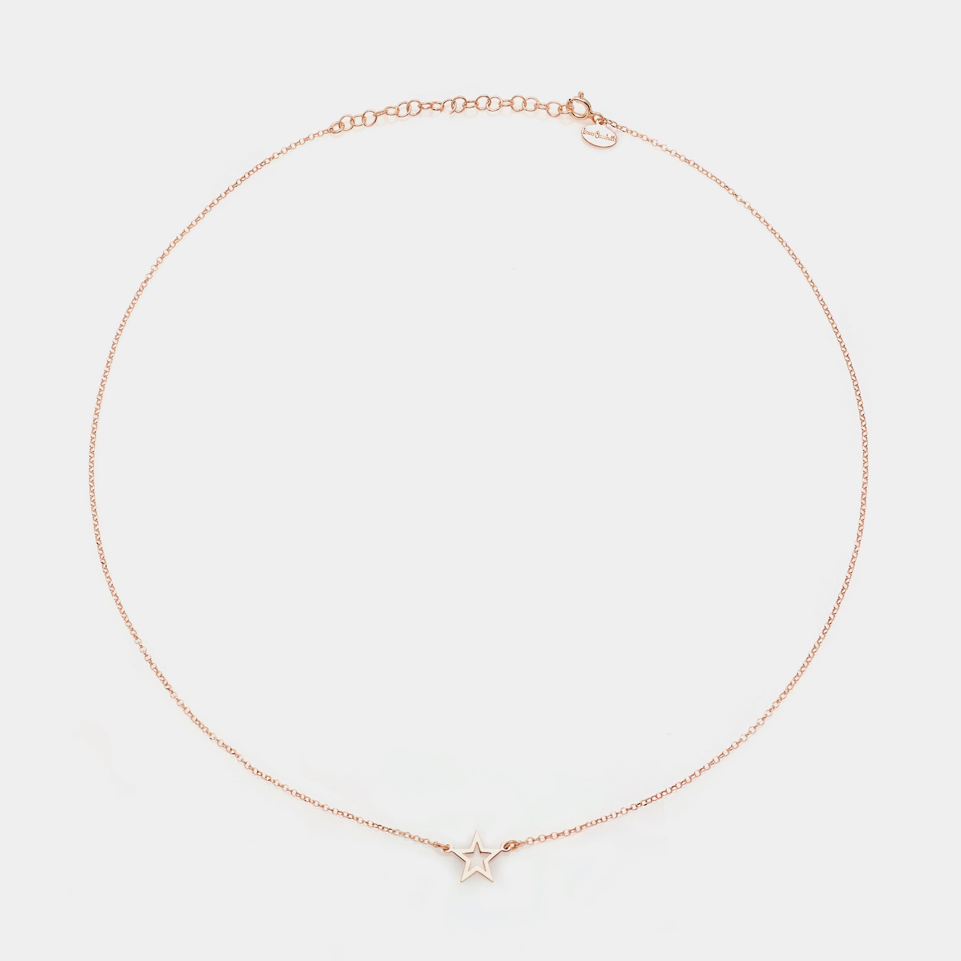 Rose gold silver necklace with pierced star centerpiece