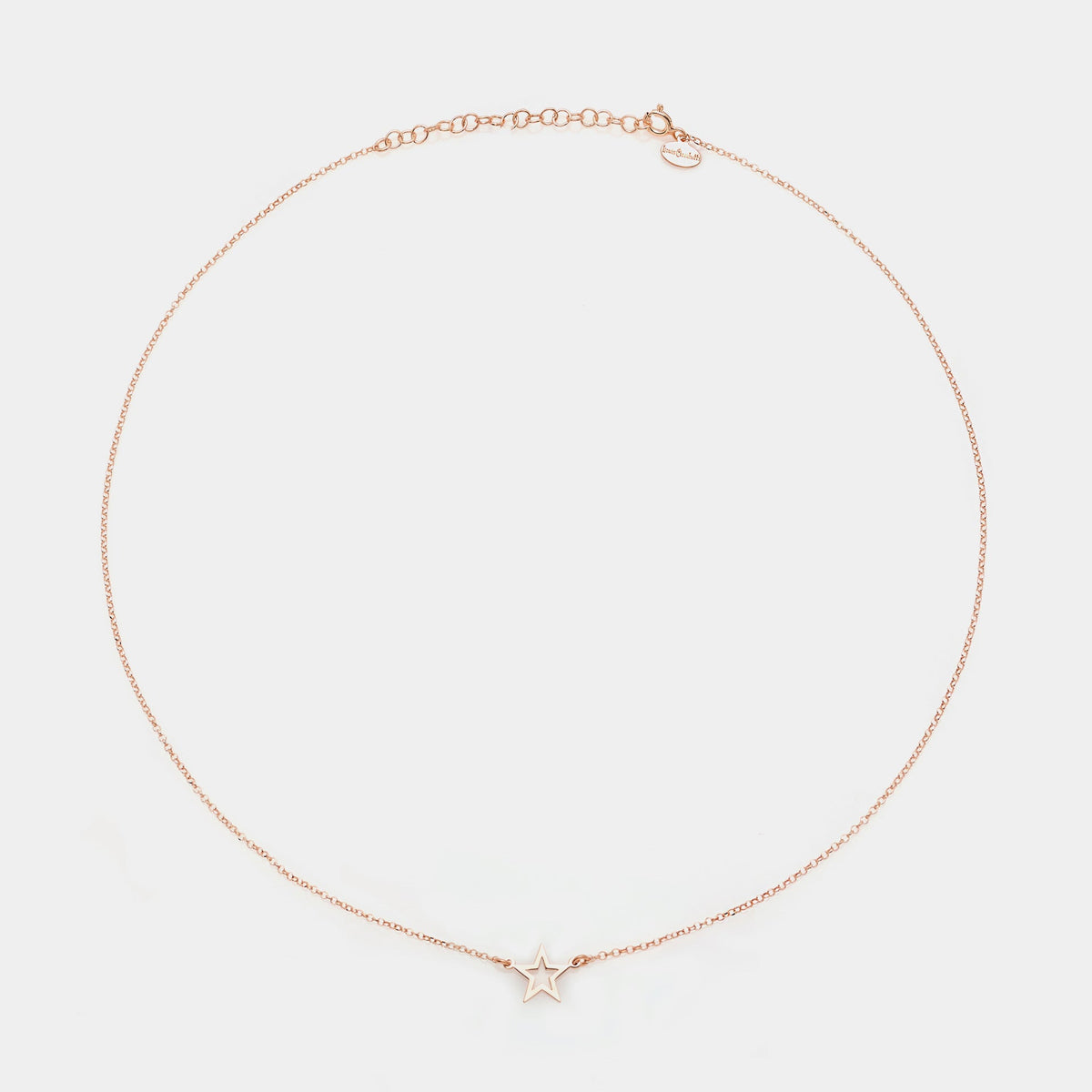 Rose gold silver necklace with pierced star centerpiece