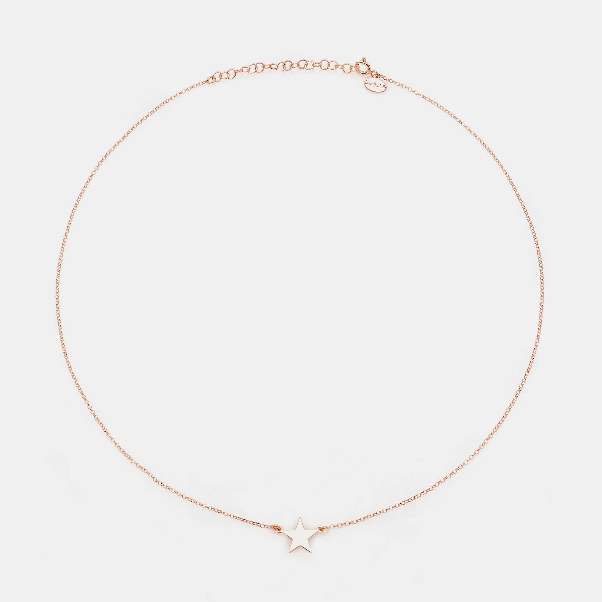 Rose gold silver necklace with star centerpiece