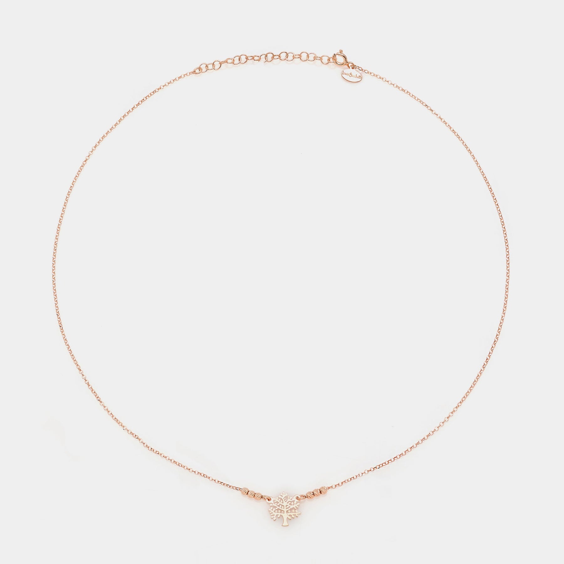 Rose gold silver necklace with pierced tree of life centerpiece and 3 faceted spheres on the sides