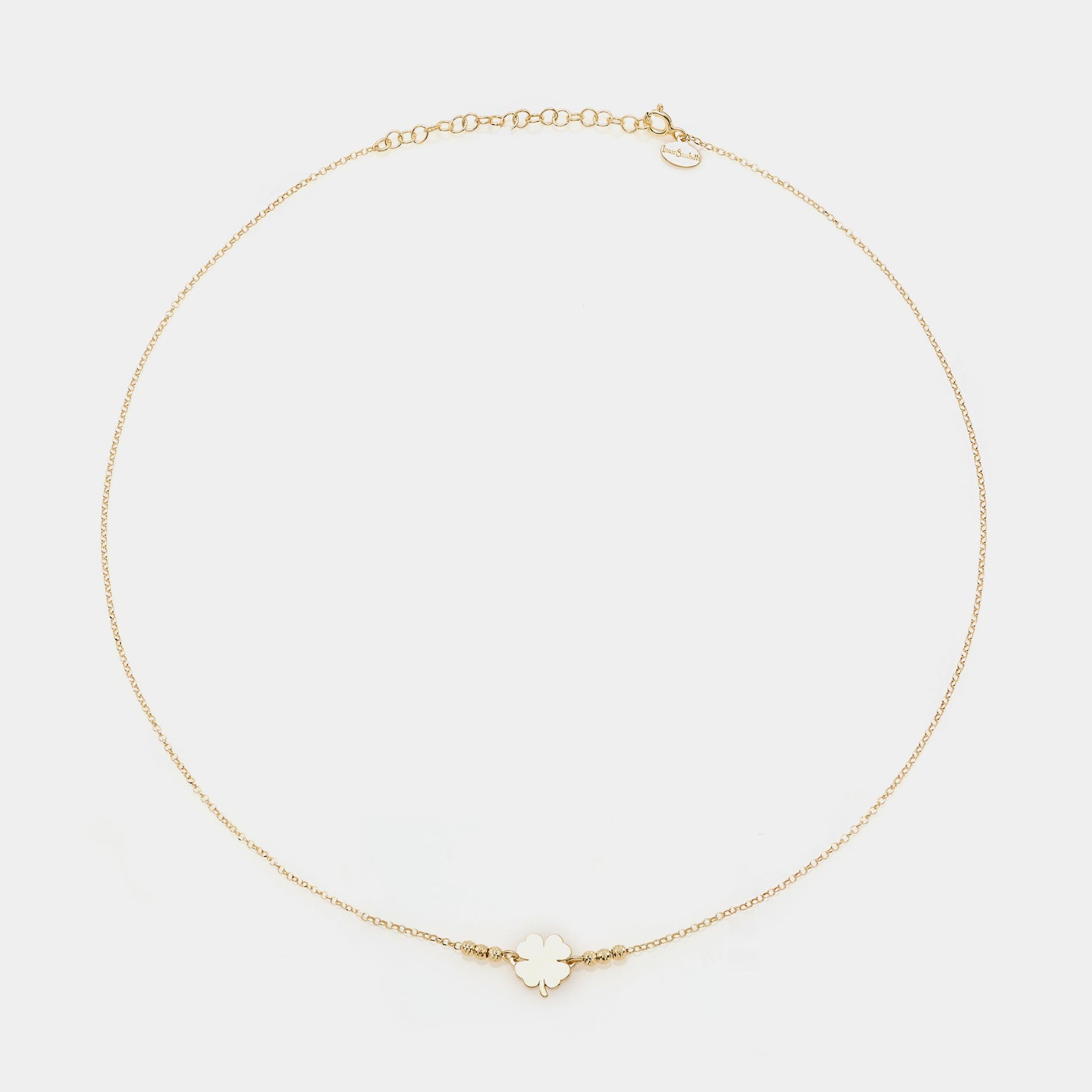 Gold-plated silver necklace with clover centerpiece and 3 faceted spheres on the sides