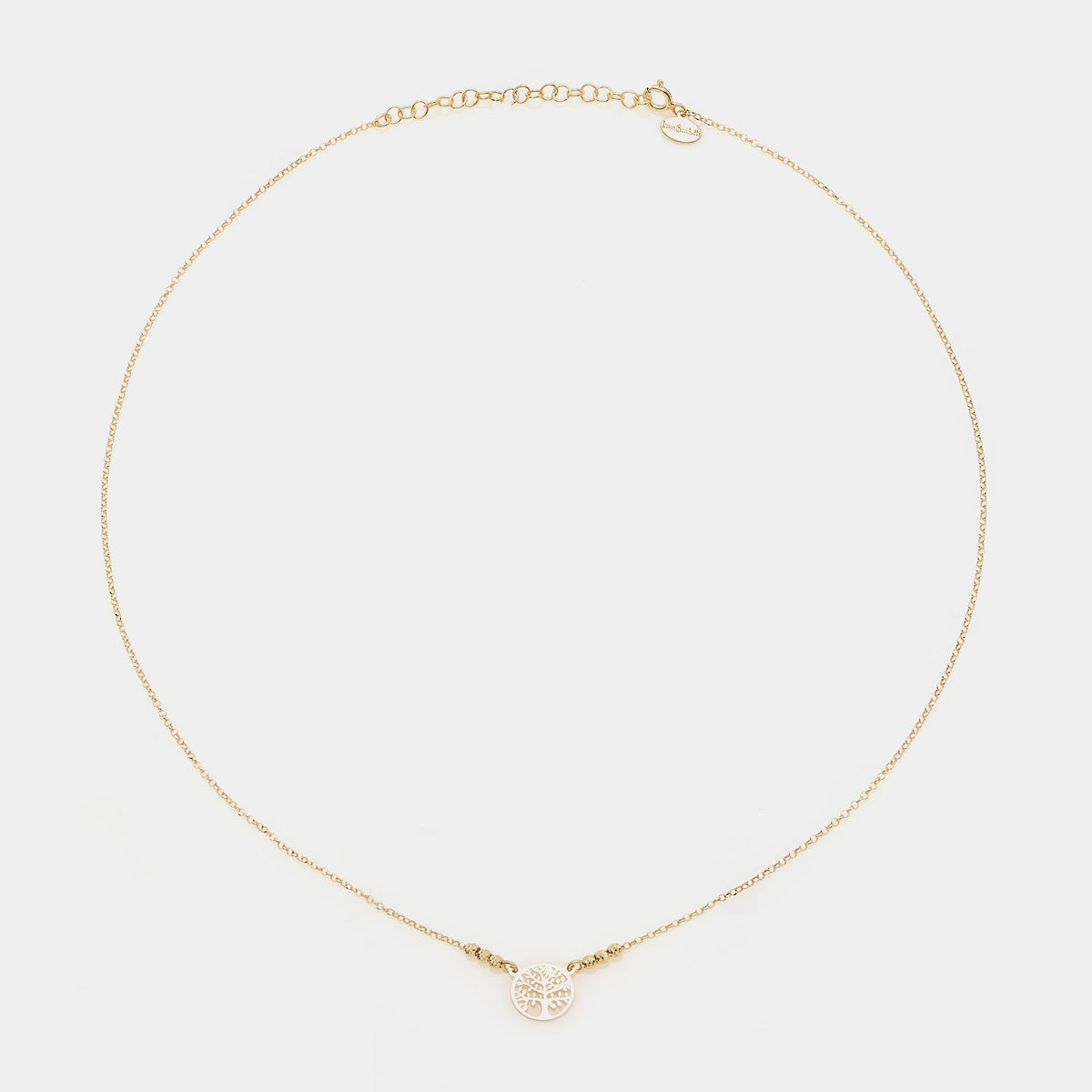 Collana argento dorato con centrale albero della vita traforato rotondo e 3 sfere sfaccettate ai lati