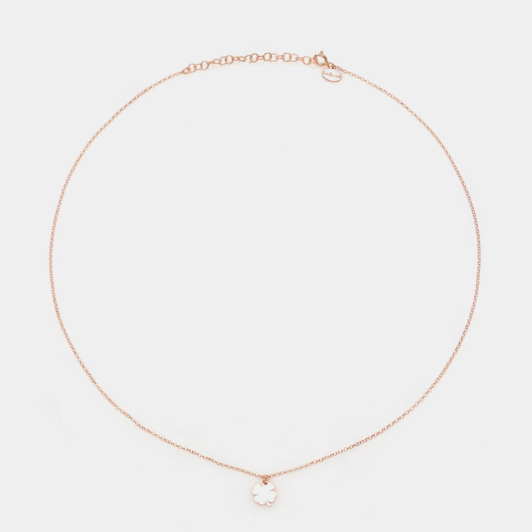 Rose gold silver necklace with hanging clover centerpiece