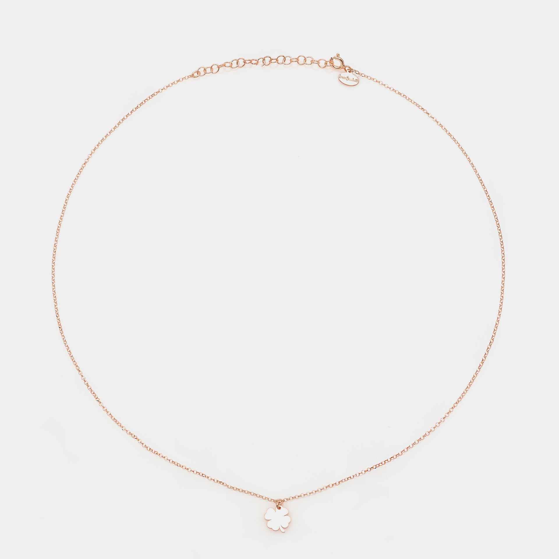 Rose gold silver necklace with hanging clover centerpiece