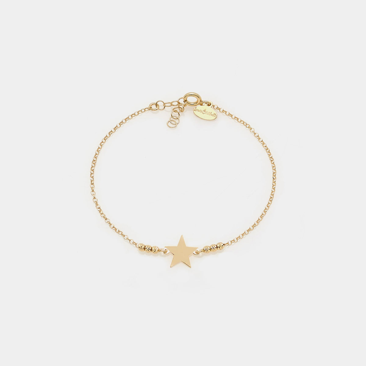 Gold-plated silver bracelet with faceted spheres and central star