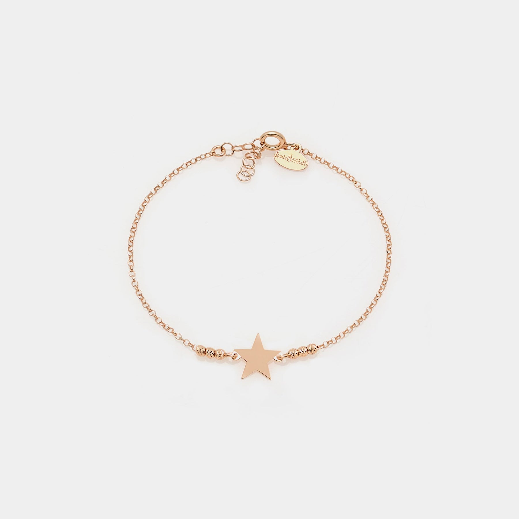 Rose gold plated silver bracelet with faceted spheres and central star