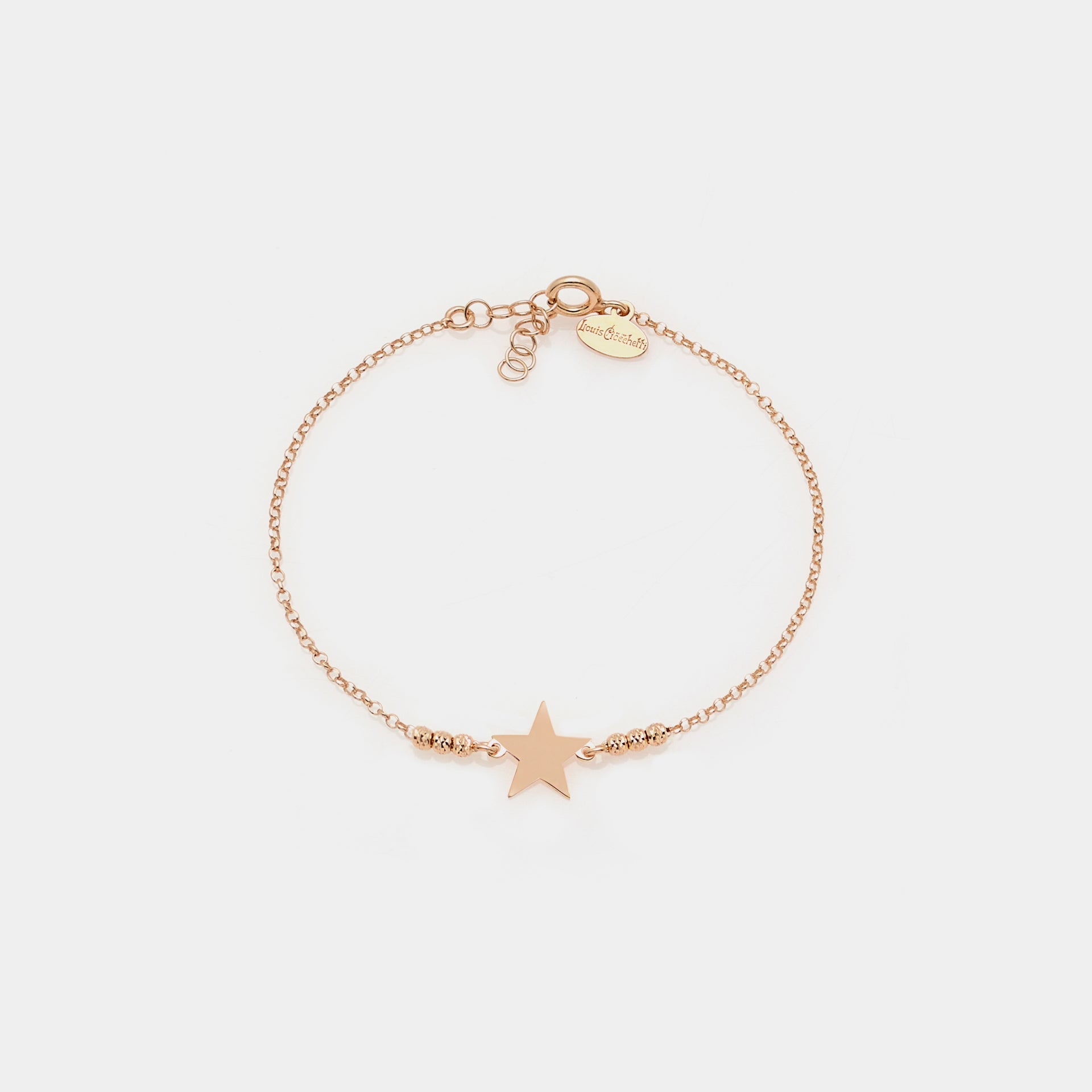 Rose gold plated silver bracelet with faceted spheres and central star