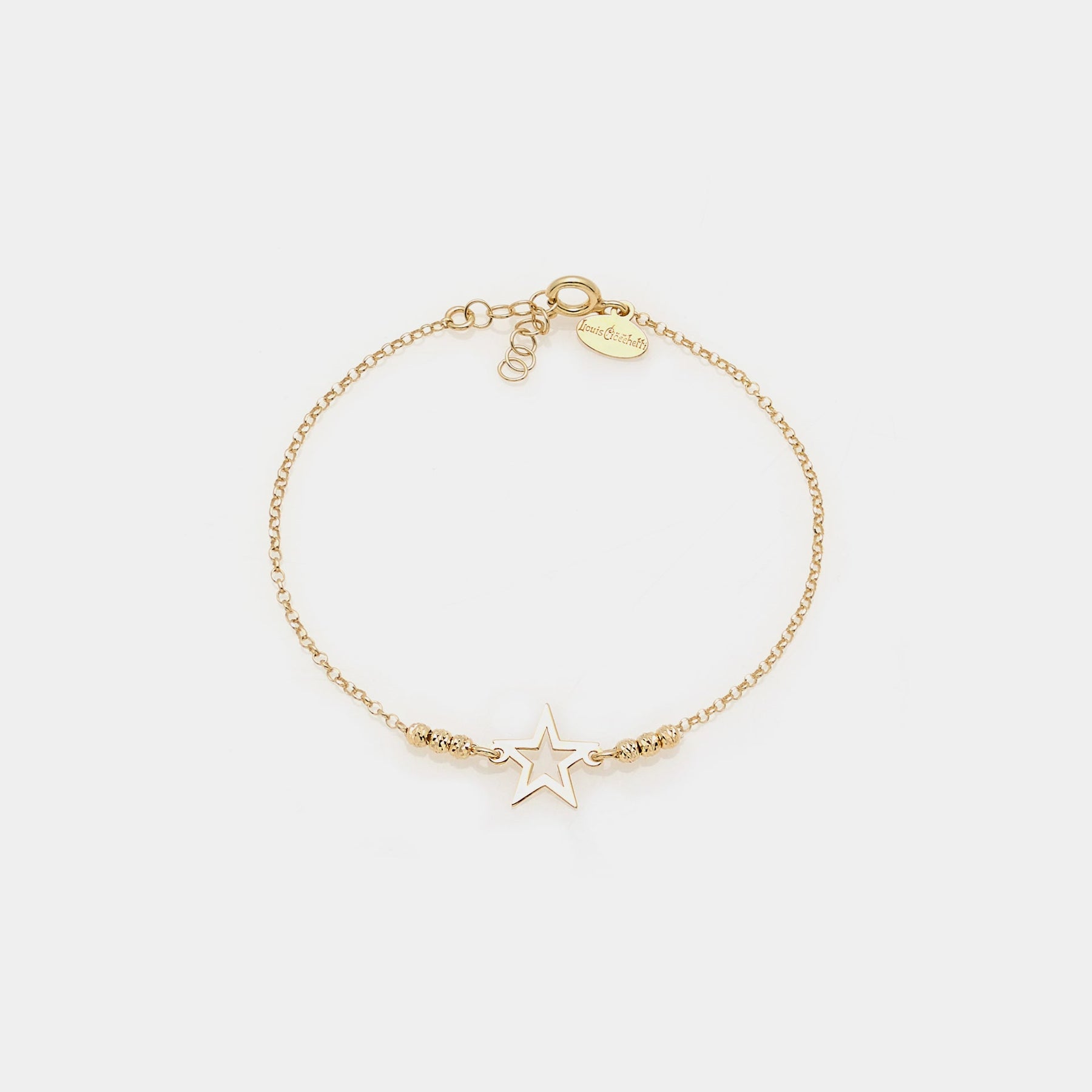 Gold-plated silver bracelet with faceted beads and central pierced star