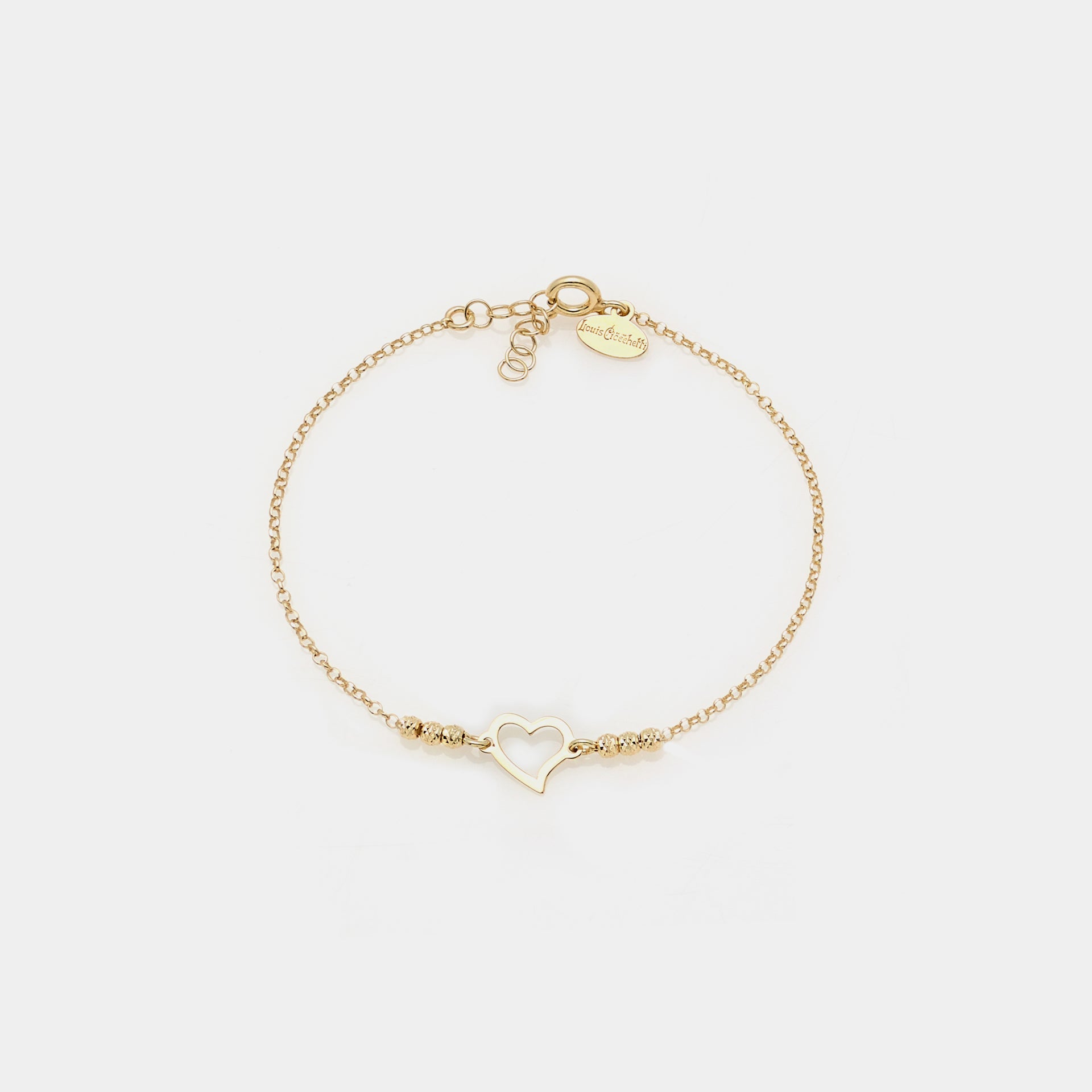 Bracciale argento dorato con sfere sfaccettate e cuore storto traforato centrale