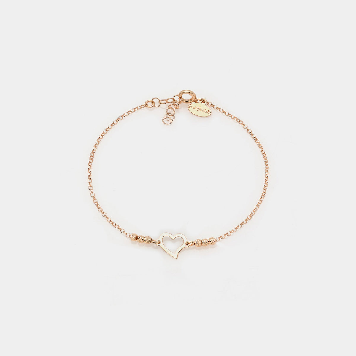 Rose gold plated silver bracelet with faceted spheres and central pierced twisted heart