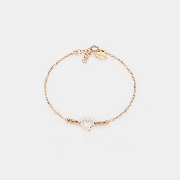 Rose gold plated silver bracelet with faceted spheres and central pierced twisted heart