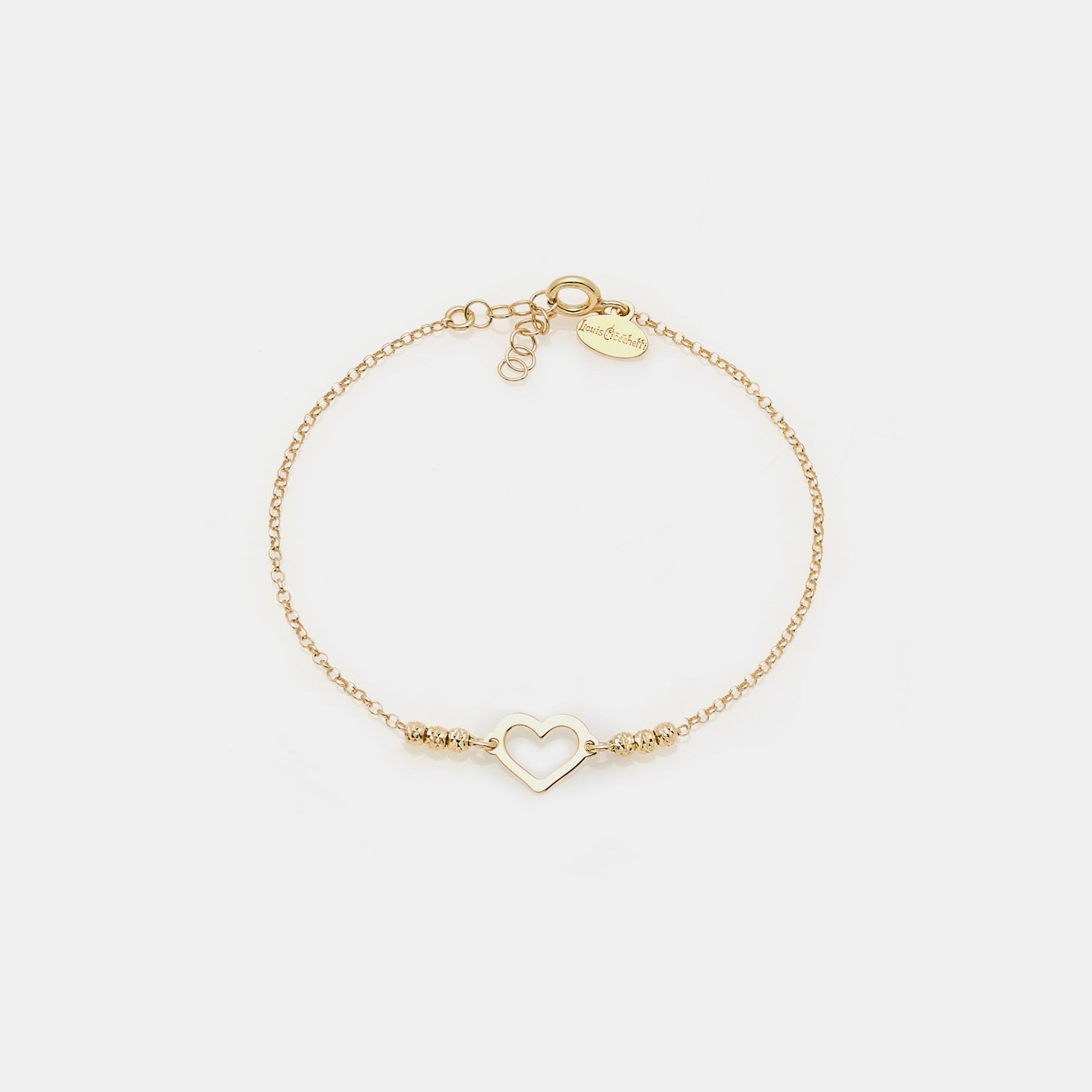 Gold-plated silver bracelet with faceted beads and central heart
